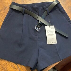 Dark blue Zara shorts.